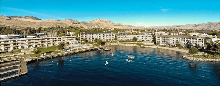 Lakefront resort with mountain backdrop